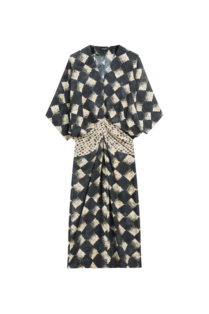 Flowing dress with sash belt detail