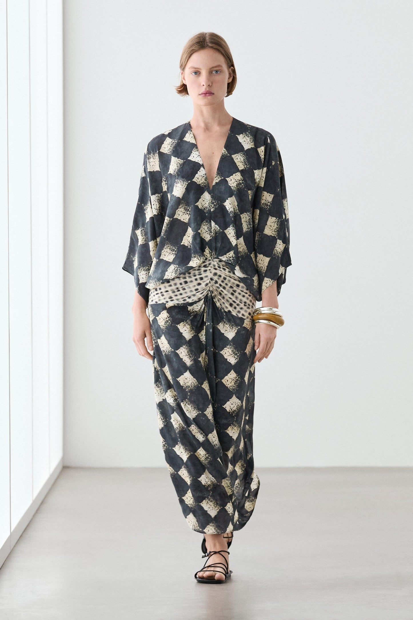 Flowing dress with sash belt detail