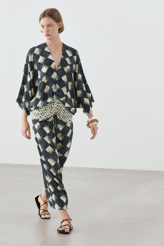 Flowing dress with sash belt detail
